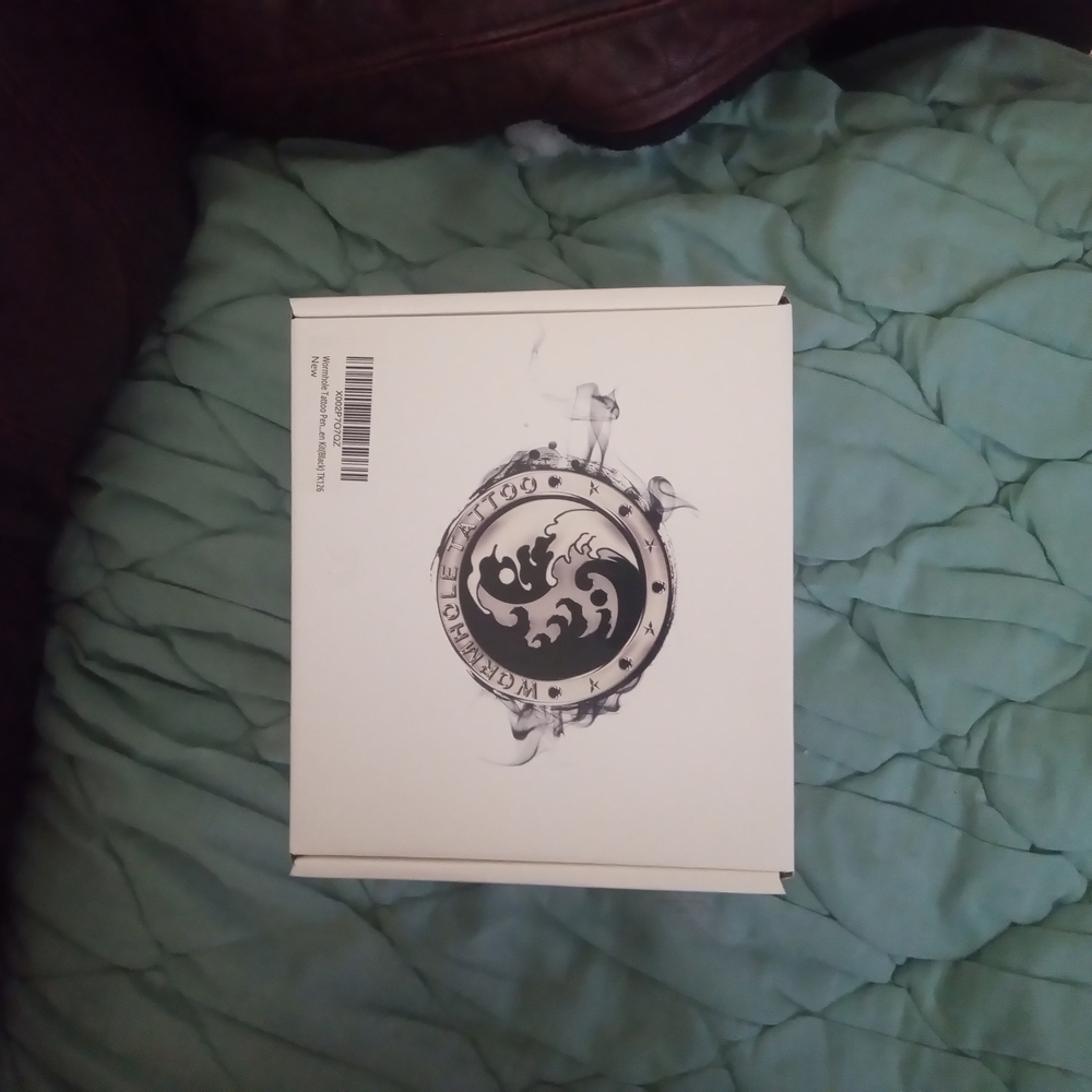 White Box with Black Dragon Emblem